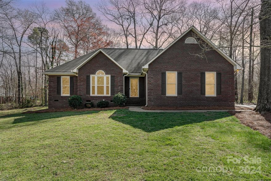 Don’t miss this welcoming full brick ranch on almost an acre! Conveniently located just minutes from the new bypass! This home has been recently updated with new butcher block countertops, refreshed cabinets, updates to the bath, many new appliances, and fresh paint throughout. The kitchen and living area are the ideal open concept space to host friends & family. Equipped with a large deck and sun room, this home makes it easy to enjoy the Carolina blue skies. The primary bathroom features a large tub perfect for relaxing after a long day. Additional desirable features include a side load garage, a large shed for storage, a private backyard, and HVAC replaced just over 3 years ago. No HOA!