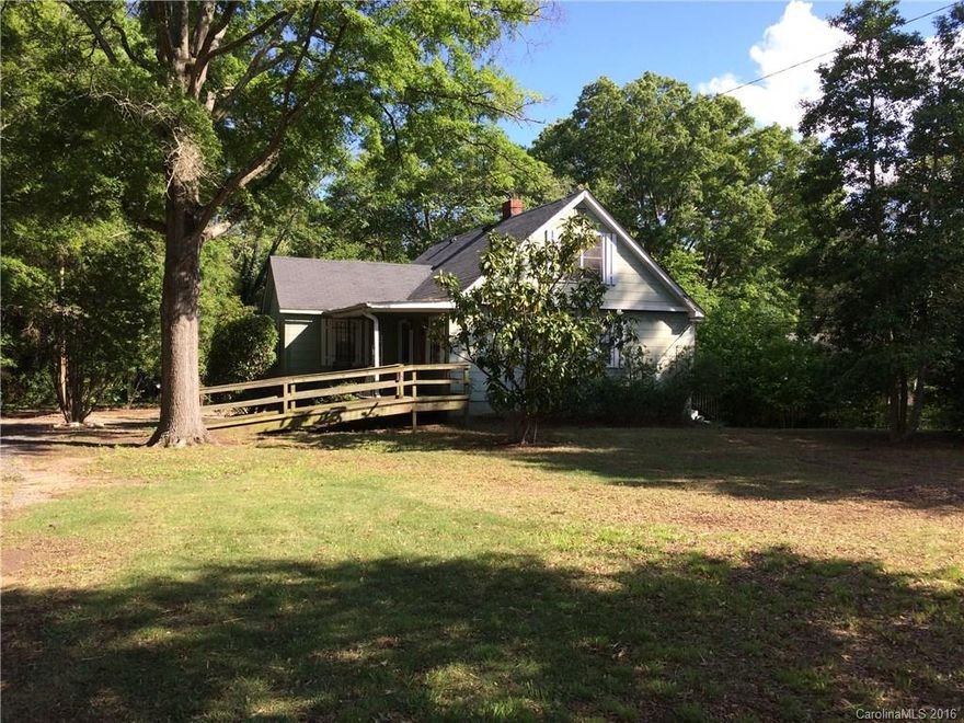 Great investment property! Home is located on 3.9 acres and has a lot of potential! This home is part of an Estate so seller has never lived in the home. Two bedrooms and bath on the main floor but there are two additional rooms upstairs that could easily be converted into bedrooms.