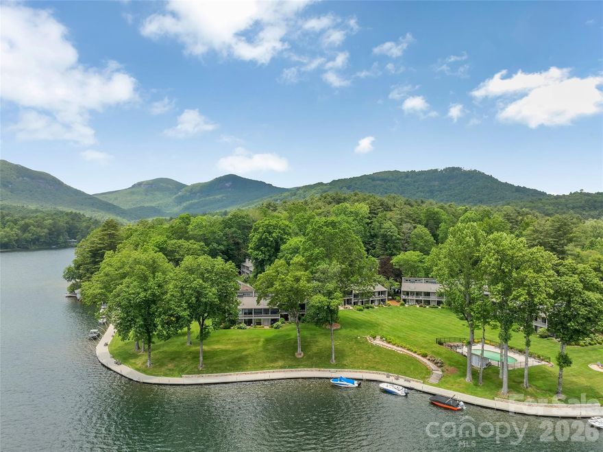 Fully furnished and beautifully renovated lakefront condo at Toxaway Shores with exceptional view of Lake Toxaway. This move-in ready unit features a newly renovated master bathroom, paint, appliances, roof, and skylights. This is a beautiful and easy way to enjoy all that Lake Toxaway has to offer.