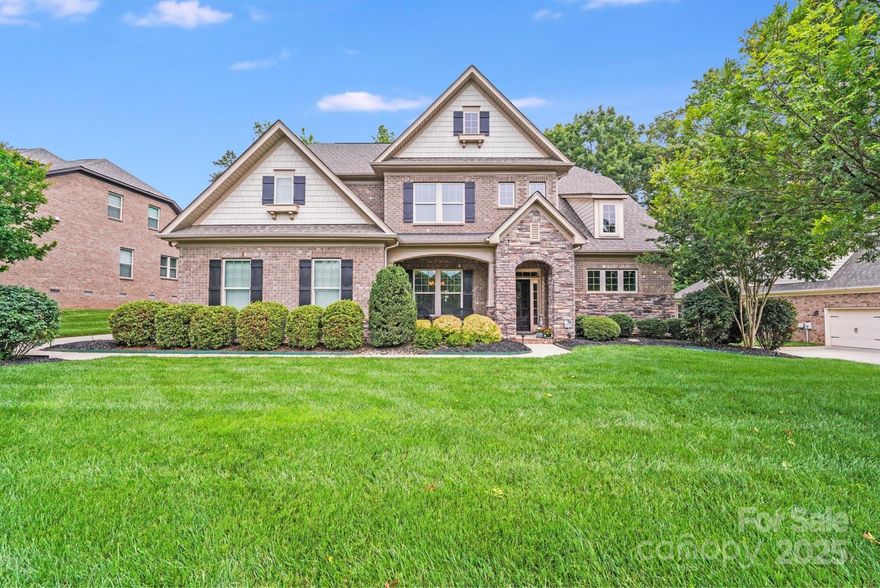Full brick beauty in Barber Rock! Meticulously maintained, this home features a primary suite on the main level, a stunning 2-story stone fireplace in the great room, and a 3-car garage. Relax on the covered front porch or in the private backyard that backs up to trees. Enjoy thoughtful modern upgrades like central vacuum, landscape lighting, and irrigation front and back. Barber Rock residents enjoy fantastic amenities including a clubhouse, outdoor pool, playground, and recreation areas. Conveniently located near Fort Mill, Indian Land, and Ballantyne and just minutes from top-rated schools, shopping, and dining. If you missed your chance the first time, this is back on market due to no fault of seller! Schedule a private tour today!