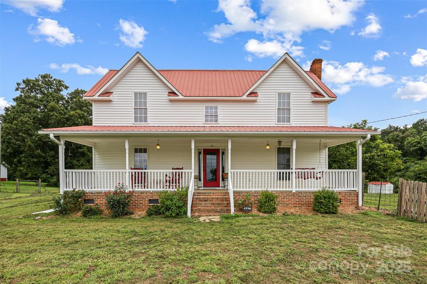 Discover this charming home nestled on an open 2.5-acre lot, offering both space and tranquility. From the welcoming front porch to the versatile freestanding garage/stable barn, this property is filled with unique features. It’s surrounded by a meticulously maintained 500+ acre tree farm, providing picturesque views in every direction. On clear days, enjoy a glimpse of Kings Mountain, with Kings Mountain State Park just a short 15-minute drive away. This home is ideal for those seeking a slower-paced lifestyle without giving up the conveniences and amenities of nearby town living.