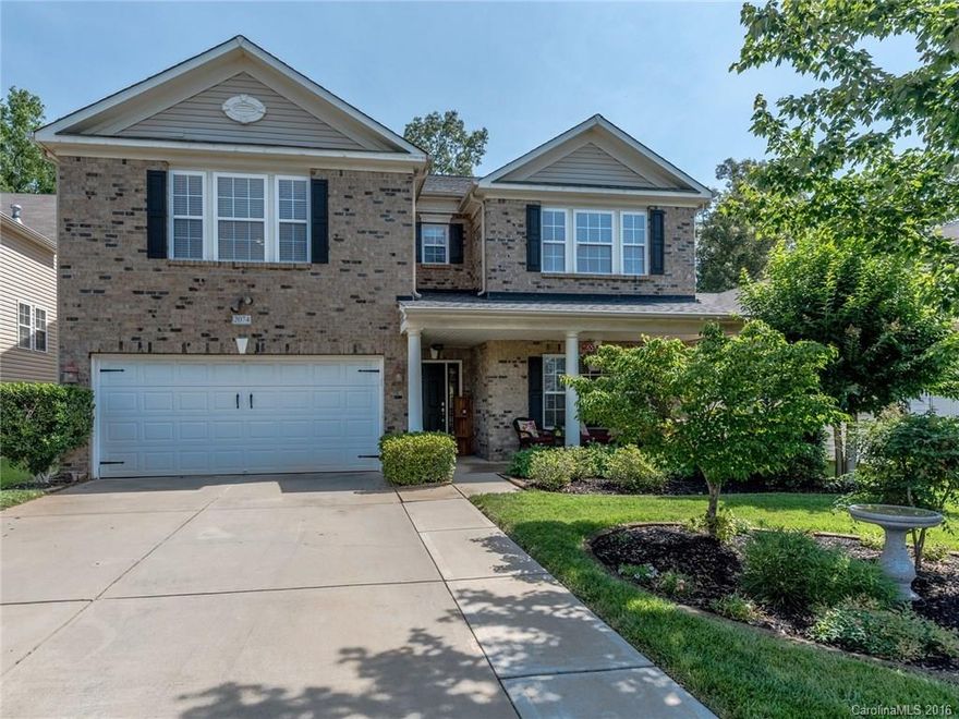 Stunning home in highly sought after Ft Mill School District. Meticulously maintained & upgraded this home features hardwood floors on 1st floor, updated lighting & fans, huge bonus room with custom barn doors w/ closet- could be 5th BR. Kitchen has 42" cabinets, island, Corian counters, SS appliances, gas range w/ double oven & enormous walk-in pantry. Outside has in-ground irrigation, large stone patio w/ in-ground gas line, & backs to wooded area. Oversized garage w/ workshop area & storage.