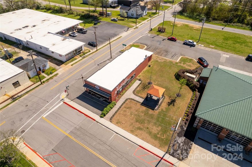 Welcome to this recently renovated and updated commercial space in the heart of Historic downtown York SC. This beauty has been lovingly updated and is ready to welcome your business! The design style is that of modern Southern chic. Barn doors, shiplap, LVP flooring, and barn wood accents turn up the charm! There is on-site parking available on the side, and rear of the building, exterior storage in the rear of the building accessed via roll-up door. The possibilities truly are endless!