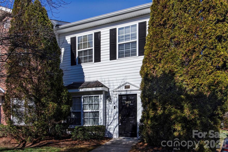 Move-in ready end-unit townhome in a gated community near Uptown and UNC Charlotte! This beautifully updated home shows like a model and offers both style and convenience. The spacious main level features a bright great room with decorative molding, a gas fireplace, and a media niche, flowing seamlessly into the dining area and an all-white kitchen with abundant counter and cabinet space. Brand-new kitchen appliances, wood-look flooring, and a full laundry room with washer and dryer hookups add everyday ease, along with a convenient half bath.

Upstairs, two generously sized bedrooms each include a private full bath and excellent storage, providing flexible living options. Fresh interior paint, new upgraded carpet and padding, and thoughtful finishes throughout make this home truly turnkey.

Enjoy outdoor living on the cozy patio looking out on a green area, and appreciate the added privacy of an end-unit location. Two dedicated parking spaces are conveniently located directly in front of the home. With its prime location, modern updates, and low-maintenance living, this townhome is a must-see.