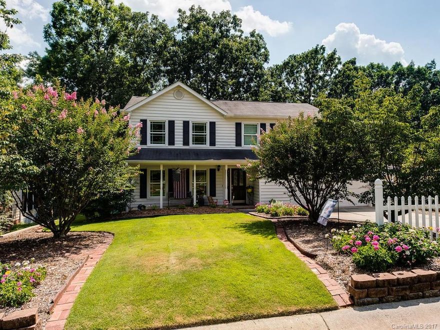 Welcome Home! Meticulously Maintained and Updated Home Featuring Covered Front Porch with Lush Mature Landscaping, Large Trees, Custom Patio and Decks with Putting Green, Fire Pit and Water Feature -Relax and Enjoy! Beautiful Hardwood Floors Throughout, Fresh Colors, Lovely Molding Detail, Smooth Ceilings, Vinyl Siding, Updated Windows, HVAC (2011). Open Kitchen/Den with Updated Stainless Steel Appliances. Attached Two Car Garage on Quiet Cul-De-Sac Street. Hurry - This Won't Last Long!