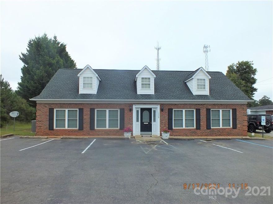 Location, Location makes this a great investment for your business. This was once used as a residential property, now a office, which ever works for you, the building is ready for the next level, has 2 complete baths, 5 or 6 offices, lobby area, conference room, and the kitchen being in the center of everything is a eye catcher. Stainless steal appliances, granite counter tops, and island,  this has it all. Located on Hwy 521 just up from Hwy 9 Bypass makes this a prime location for the business hub. Come see what all this has to offer.