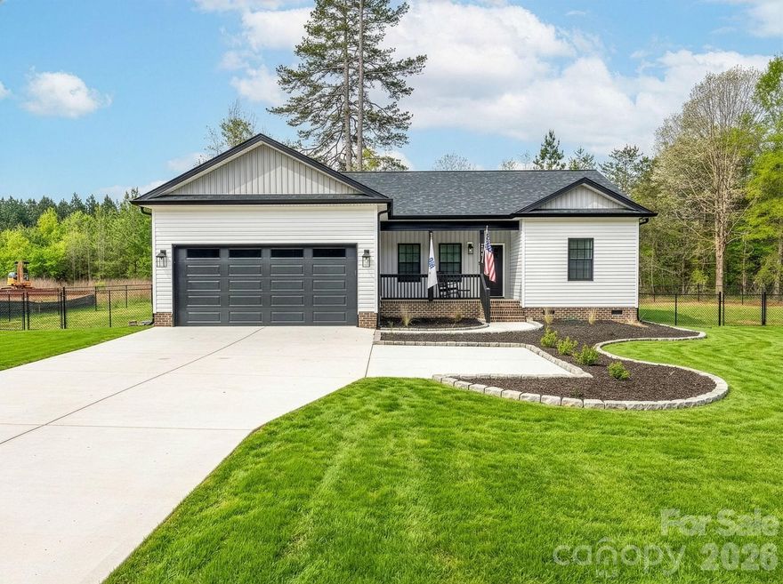 Welcome to country charm with a fresh modern twist at 2462 Shoal Rd in Crouse! This beautiful home offers the perfect blend of style, comfort, and privacy, all nestled on just over an acre. Step inside to discover a bright and inviting open-concept layout with sleek luxury vinyl plank flooring, a spacious living area, and a stunning kitchen designed to impress with granite countertops, ample cabinetry, and included appliances.
The thoughtfully designed split-bedroom floor plan provides privacy and functionality, while the spacious primary suite offers a relaxing retreat with a walk-in closet and private bath. Outside, enjoy peaceful mornings on the covered front porch and unwind in the evenings on the rear patio overlooking your large lot and serene surroundings.
With a 2-car garage, modern finishes throughout, and the tranquility of country living while still being convenient to nearby schools, shopping, and dining, this home delivers the space, style, and lifestyle today’s buyers are looking for. Move-in ready and built to impress — don’t miss your chance to make this one yours!