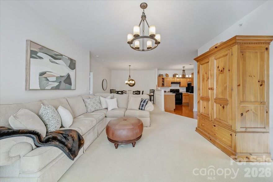 Nestled in the heart of Ballantyne, this sought-after main-level Copper Ridge condo is a true gem—no stairs, no hassle! Step into this immaculate 2-bedroom, 2-bathroom (split floor plan), where charm meets comfort and natural light pours into every corner.

The open floor plan invites you to relax in the cozy family room, complete with a fireplace & door  that lead to your own covered patio—perfect for morning coffee or evening unwinding. (additional storage as well with shelving) The spacious dining area flows seamlessly into the eat-in kitchen, featuring a breakfast bar that’s perfect for casual meals. The primary suite boasts a serene ambiance with a walk-in closet and en-suite bathroom, while the split floor plan offers privacy for the secondary bedroom—ideal as a guest room, home office, den or roommate. Plus, you’ll appreciate the convenience of an assigned parking space.

Living here means low-maintenance ease, with water, exterior upkeep, and trash removal included in the HOA. You’ll also enjoy an array of community amenities, from two swimming pools, tennis courts a fitness center, clubhouse, and picnic areas. The lighted streets and manicured common areas create a welcoming vibe, making this neighborhood a standout.

Convenience is key, and this location delivers! Just a short drive to Ballantyne Village & The Bowl- vibrant dining & shopping & coveted Ballantyne Spa. Whether you’re looking for relaxation, recreation, or easy access to everything you need, this condo checks all the boxes. Don’t miss out on this perfect Ballantyne lifestyle—schedule your visit today!

This unit is tucked away at the back of the developled which is perfect for low traffic and no cross through traffic.