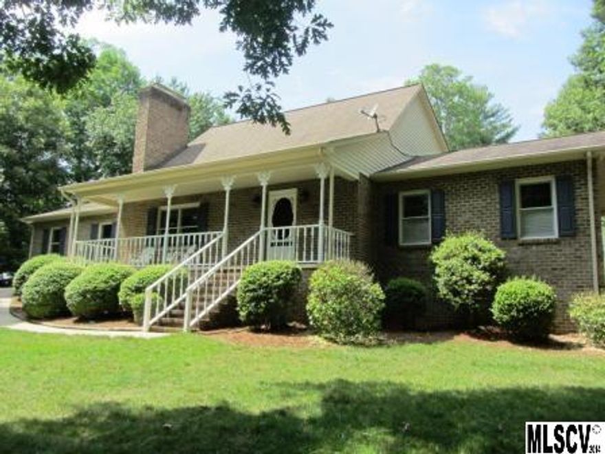 Beautiful well maintained all brick home with an inground pool.  This home has it all....granite counter tops, gas range, stainless steel appliance, hardwood floors, two fire places, mostly finished basement with plenty of unfinished allowing for storage.  There is also an outbuilding towards the back of the property to keep your lawn & gardening equipment.  Two driveways, one giving you access to attached double garage and the other giving you more parking for guests and access to the basement area. Convenient to shops, restaurants, and Hwy 321.