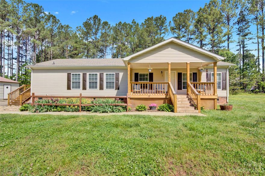 This one-story home is a rare find, situated on almost an acre of land and boasting a host of impressive upgrades. Step inside to discover new flooring in the family room, 3 bedrooms and 2 bathrooms in a tranquil setting. The new front and rear porches provide the perfect spots to relax and soak up the beautiful natural surroundings, while an oversized detached garage/workshop is a dream come true for any car buff or DIY enthusiast. And with an additional parking area for RVs, boats, and other recreational vehicles, this property offers plenty of space for all your outdoor hobbies and interests. With no HOA to worry about, you'll have the freedom to make this property your own. Enjoy peaceful living in convenient Denver, with easy access to NC Highway 16!