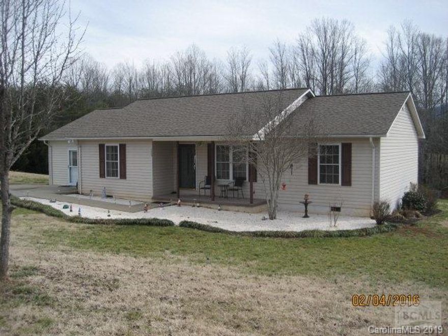 Enjoy the mountain views from this 3 BR 2 bath, split bedroom layout ranch home. Home features large rear deck overlooking rear yard, small storage bldg beside dog lot stays. hardwood floors in LR/Dining and bedrooms, large MBR, master bath w/dbl vanity, galley kitchen w/range, refrig, DW, over the range microwave and Freezer stay. Garage has been converted into finished Man cave/family room with seperate wall heat/cool unit. Ida View is private road not state maintained. Home carries 1 year homebuyer warranty. Must See!