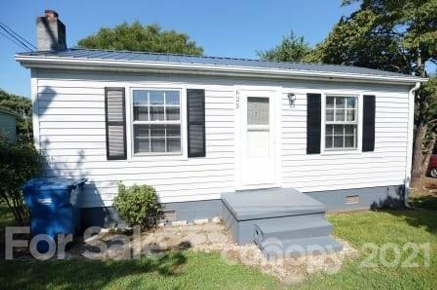 Cute 2 bedroom, 1 bath home, recently remodeled with new metal roof, kitchen appliances, with new flooring and refinished wood floors. Laundry nook is good for stackable units. Large deck, fenced yard, and detached covered carport in rear of the house. Currently rented on a month-to-month basis for $625/month.