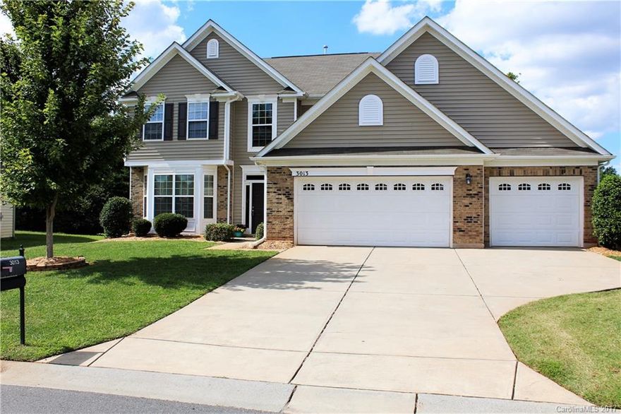 Superb area with shopping, restaurants, etc. close by.  Lovely 2 story with 3 car spacious garage, engineered hardwoods, large kitchen with large island in the middle, spacious breakfast, lovely granite , columns, great moldings.  Bedroom down for office or media.   Spacious master up with wonderful walk-in closet, large bedroom/bonus (very spacious for a pool table),  wonderful privacy fence around backyard.  Please NOTE:  Fort Mill address but in Indian Land schools.