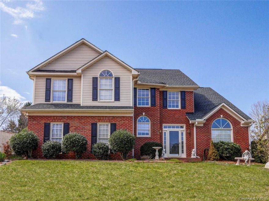 Hurry! Priced aggressively. Sellers want this home sold…. Relax under your large covered patio and enjoy your spacious fenced backyard. Side load garage.  Elegant open foyer. Nice size kitchen & large master bath. His And her closets. NEWER - interior paint, light fixtures, stove, microwave, flooring, roof, upstairs A/C & hot water heater. Formal living and dining room. Laundry room upstairs with bedrooms. Quick walk to community pool, playground, tennis courts, volleyball court & club house.