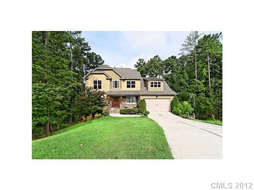 LEASE PURCHASE option! 3 beautiful levels nestled on wooded cul-de-sac in amenity rich LAKE community!  Spacious Formal Living/Study with built in cabinetry.  Kitchen with granite, rich cherry cabinetry, & stainless appliances.  Guest Suite (5th BR) & recreation room on lower level.   Sandy beach, tennis, walking trails, pool, marina, golf course!