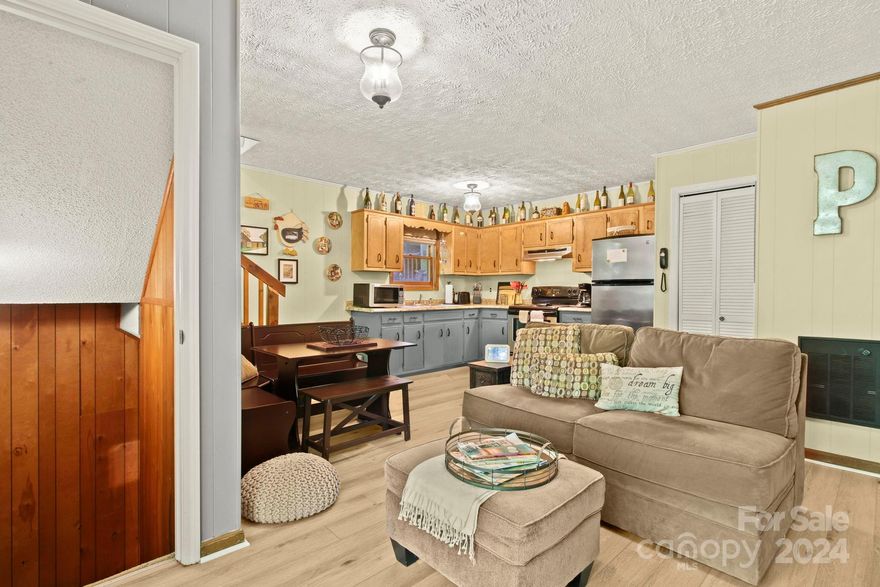 Nestled in the picturesque Mill Ridge community, this charming 2-bedroom, 2.5-bathroom cottage offers the perfect blend of comfort and convenience. Just 10 minutes to Boone and 15 minutes to Blowing Rock and Banner Elk, this home is perfectly located for all the High Country has to offer! Thoughtfully maintained and fully furnished, this cozy home has been used as a second home getaway since 2008. The main level boasts updated flooring, adding a touch of modern elegance to the warm, inviting interior. Located just minutes from Boone, Blowing Rock, and Banner Elk, you'll enjoy easy access to the best of the High Country. The walkable community features an array of amenities, including an outdoor pool and tennis courts, with additional options for simply relaxing in a serene environment. Whether you're looking for a tranquil getaway or a charming full-time residence, this quaint Mill Ridge cottage is an exceptional opportunity.