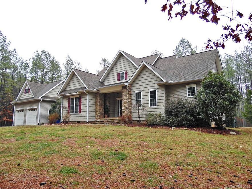 Gorgeous and inviting 3 BR/3 BA home in a secluded setting is everything you’ve been searching for!  Located on over 12 wooded acres, this lovely home features a fantastic open floor plan with master on main, vaulted living with 2-story stone fireplace, warm hardwoods, cozy loft, spa-like master bath with granite countertops and Whirlpool, custom ceramic tile, granite and stainless kitchen, screened porch, detached garage, and so much more!  Comfortable living in a private setting awaits…