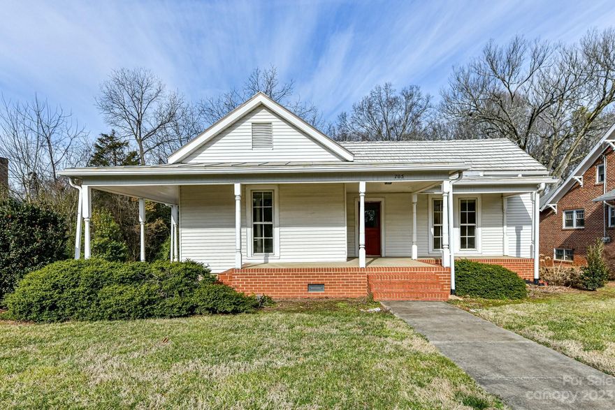 Extremely rare opportunity to own a .634 acre parcel on N Main Street in Davidson! One block from the main entrance to Davidson College,this property has great potential for the buyer who wants to revovate a lovely home. One story, 3 BR/ 2 Bath home was built in 1900. House has many beautiful features. The property is being sold AS IS & it is located in an Historic District of the Davidson VIP Zoning Area. Property features a large, well-maintained gravel driveway/parking area. Has a tall walk-in crawl space which could be turned into a heated basement. Large, private rear yard w/ so many options. Large front porch. The rear .13 acres of the parcel is located in the N-S Railway easement. Please see the Historic District attachment which explains the Town's process for renovation   Per VIP guidelines the property qualifies for up to 4400 +/- of heated square footage (excluding basement & detached garage). There is ample room for a detached garage/apt.