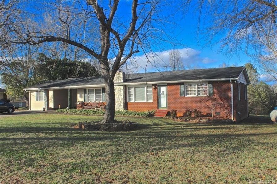 3 bedrooms & an office. The floors are wood & ceramic, w/ 1 bedroom still having carpet.  Wood under that carpet. Many updates,spacious, & neat. New windows in '07 & '09.  New gutters in '09 w/ gutter guards. New furnace in 2008. Bonus room off the carport that can be used for many things. Kitchen remodeled, it & the breakfast area have ceramic tile floors. Large utility room w/ plenty of space for washer & dryer. Yard is relatively flat, has some shade trees and offers a large play area.