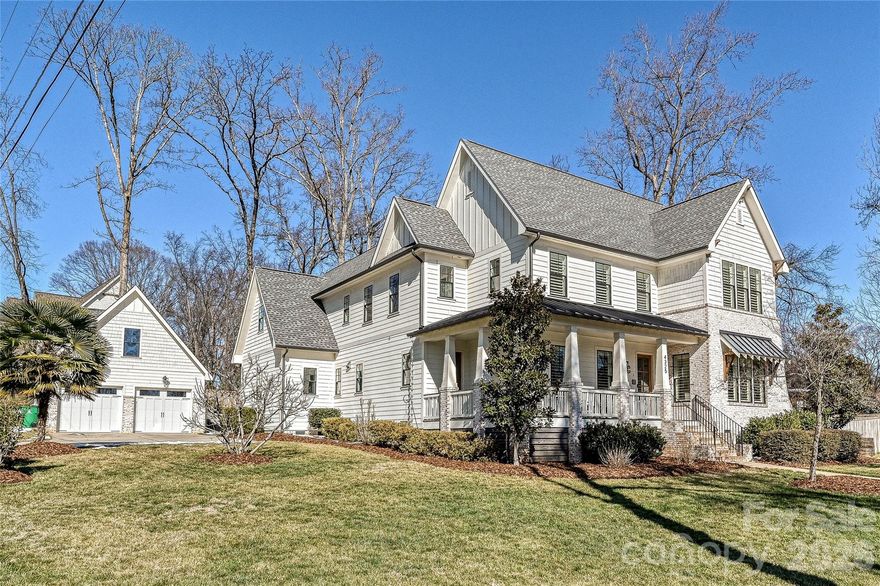 Set on a stunning .46 acre corner lot with exceptional curb appeal, this like-new modern farmhouse by Pike Properties offers luxury living in the coveted Cotswold neighborhood. The 5 bedroom, 4 1/2 bath home features white oak floors, 10’ coffered ceilings, abundant natural light, Hunter Douglas window treatments, Generac whole home generator, and multi-zone Nest thermostats. The gourmet kitchen features high-end appliances, substantial island, instant hot water dispenser, walk-in pantry, butler’s pantry and opens to the great room with gas fireplace and custom built-ins. The primary suite includes a vaulted ceiling, reading nook, and spa bath. The private, expansive, fenced backyard is tiered with multiple outdoor living areas, including a heated saltwater PebbleTec pool with travertine decking, 7 person Caldera Spa, screened porch, stone patio, landscape lighting, and 4,000 sq ft of premium synthetic turf plus custom shed. Detached 2 car garage with 485 sq ft of semi-finished, flex space above. Close to shopping, dining, and Charlotte Swim and Racquet Club. Additional photos and details in photo tour link.