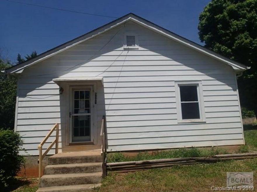 HUD Case#381-819778.FHA Insured Escrow Financing Available with $2970 in required repairs.Purchase this home for VERY LITTLE DOWN!See your agent for details.This cozy 2 bedroom 1 bath cottage is located on 5.3 acres just outside Morganton NC. The single level floorplan includes a spacious living room that leads into the open concept kitchen.2 bedrooms and a centrally located bathroom, with what appears to be newer fixtures, and a laundry room complete the interior. Hardwood flooring is throughout the homm. There is a partial unfinished basement for your storage needs, and an outbuilding.This is affordable country living with plenty of room to roam!! Home sold As-IS/WHERE-IS with all faults.Buyer or buyers agent to verify all stats.Equal Housing Opportunity