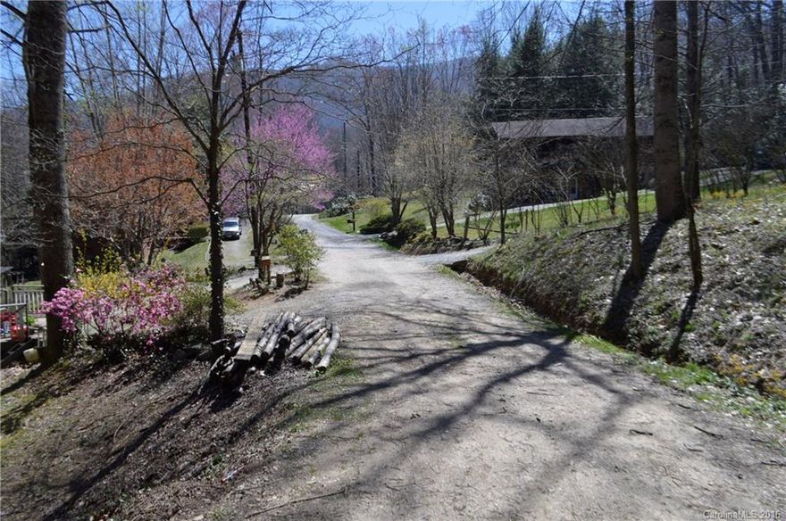 Two lots being sold together...Two Driveways... two house pads... or more privacy with both...  easy year round access in Mountain Subdivision... not highly restricted with 800 square foot minimum size of foundation... see restrictions... creek on left side of lot and along frontage on first lot... second lot sits up on a knoll... woodsy ... lots Have been owned since 1986  - neighborhood has mix of year round and seasonal action homes.