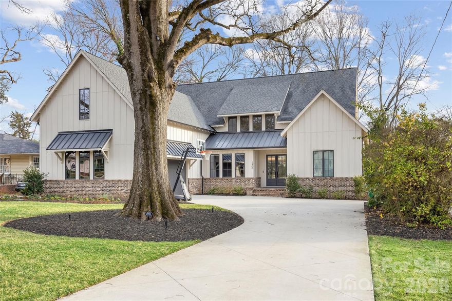 Beautifully crafted by Mills Eloge Homes in sought-after Ashbrook. White oak floors, soaring ceilings, tall windows, and custom high-end finishes create an open, light-filled floor plan with exceptional flow. Chef’s kitchen features custom cabinetry, quartz countertops, expansive island, Wolf & Sub-Zero appliances, and a scullery for added storage. Main-level owner’s suite offers a spa-like bath with dual vanities, soaking tub, frameless glass shower, and oversized walk-in closet with 2nd laundry. Additional highlights include a side-load 2-car garage, drop zone, dedicated laundry room, main-level office/guest bedroom, bonus room, and three bedrooms upstairs with ensuites. Enjoy year-round outdoor living on the covered porch with disappearing doors, automatic screens, and gas fireplace overlooking a fully fenced, professionally landscaped yard. Prime Ashbrook location near popular shops and dining.