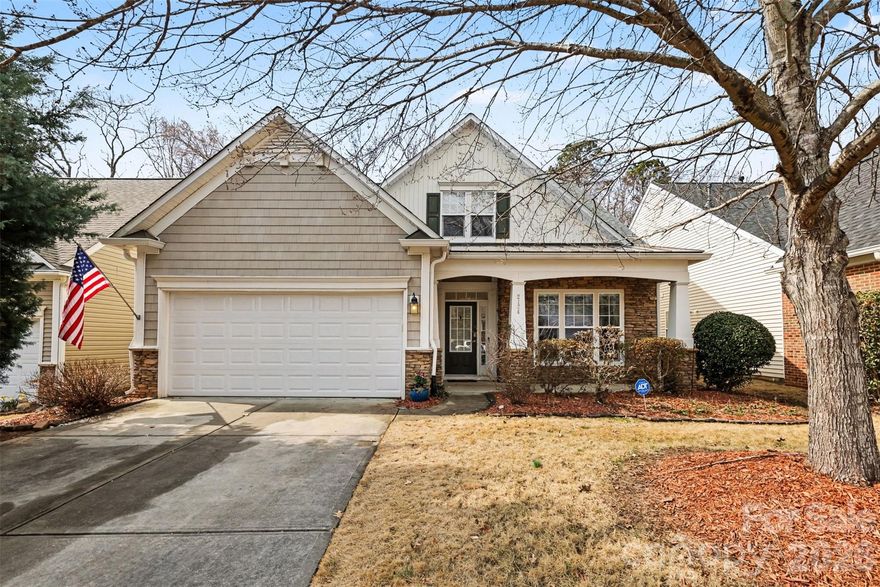 LAWSON | Lawn Maintenance Included | Cuthbertson Schools
Welcome to this beautifully maintained home in the highly desirable Lawson community in Waxhaw.
A rare and functional floor plan features a spacious primary bedroom suite on the main level overlooking the private backyard, along with a second main-level bedroom with full bath access — ideal for guests or a home office. The open layout is perfect for everyday living and entertaining, highlighted by a dramatic two-story great room with gas fireplace that flows seamlessly into the kitchen and sunroom. The kitchen offers granite countertops, center island, stainless steel appliances, pantry, and casual dining area. Hardwoods throughout much of the main level add warmth and character. Upstairs includes a third bedroom with walk-in closet and full bath, plus a versatile loft with walk-in storage. Enjoy the oversized rear deck, charming front porch, and quiet cul-de-sac location. Lawson offers exceptional amenities including pools, clubhouse, fitness center, tennis courts, nature trails, playgrounds, sidewalks, and street lights — all minutes from shopping, dining, and historic downtown Waxhaw. A wonderful opportunity in one of Waxhaw’s most established, amenity-rich communities.