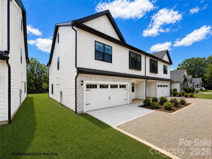 Create your own back yard oasis! Fully fence in your entire large back yard! Located in the heart of the highly desirable Cotswold area of Charlotte with desired schools.  This beautifully appointed duet-style home offers the space and feels like a single-family residence without the single-family price tag and with NO HOA dues. Thoughtfully crafted by SouthCraft by EMPIRE HOMES, every detail reflects intentional design and elevated finishes that make everyday living feel refined.Step inside to discover a bright, open floor plan designed for both functionality and luxury. The kitchen serves as the heart of the home, seamlessly overlooking the dining and living areas, making it ideal for gathering and entertaining. A stunning waterfall Carrara quartz island anchors the space, complemented by 42” cabinetry with soft-close drawers, wide plank flooring, a gas range, microwave drawer, designer hood, and dishwasher. A custom wood-shelved corner pantry. An extended beverage bar add thoughtful convenience, perfect for hosting, setting up a coffee station, or grabbing a quick energy/hydration drink on your way out the door.Nine-foot ceilings on both floors create an airy, expansive feel, while high-end molding adds architectural depth and sophistication throughout. Just off the dining area, an extended sunroom fills the home with natural light and opens to a spacious deck complete with a gas stub line so you’ll never worry about running out of propane before guests arrive.Upstairs, all bedrooms are generously sized and thoughtfully positioned for privacy. The primary suite feels like a true retreat, featuring a custom wood-shelved closet system designed for both beauty and organization.   A tankless water heater ensures you’ll never run out of hot water, enhancing comfort and efficiency. Architectural shingles and Low-E windows further elevate the home’s quality and energy efficiency.Outside, the backyard offers endless potential. Whether you envision a custom entertaining patio, a future pool, lush landscaping, or a private outdoor sanctuary, the deep, level yard provides the perfect canvas.This is more than a home, it’s an opportunity to enjoy luxury finishes, modern functionality, and exceptional value in one of Charlotte’s most sought-after neighborhoods.