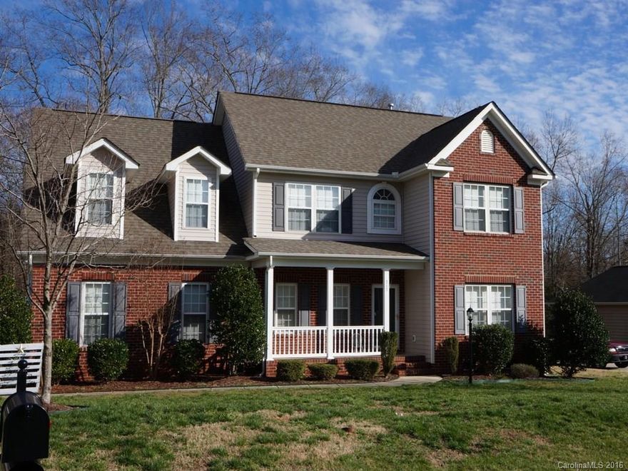 Price reduced! Come home to this great house! Enter into the large foyer with hardwood floors & high ceilings. The kitchen has granite countertops, 42" cabinets new DW, hdwd floors in kit.entry dining and brkfst nook is open to the living room. Deluxe MBath, Huge yard, multi-level deck perfect for entertaining & extra large garage with workshop. Sit on the deck and enjoy the sounds of nature!  The sellers are providing a $600 credit towards a new range.