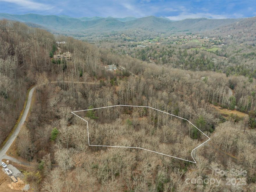 If you seek the unrivaled combination of privacy, security, and convenience that The Cliffs at Walnut Cove provides but are not interested in a membership in the club, then this homesite is calling you! This lot has an elevated build pad and long-range views towards downtown Asheville. Easily accessible to the back security gate on Misty Valley Parkway off Brevard Road – Hwy 191, you are conveniently located between Asheville and Hendersonville, and just a short drive away from local history, hiking, exciting nightlife, shopping, and fine dining. Rarely would you consider a Walnut Cove lot without a membership; but with this property, it works!  

That said, if you do want a membership there is a way to make that happen. Please contact Listing Agent for details.