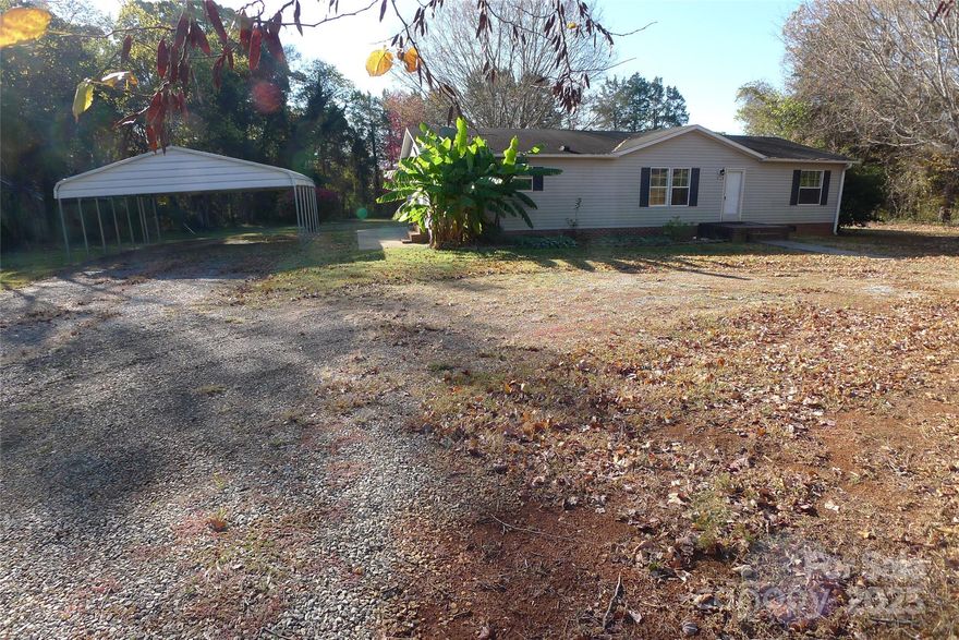 Welcome home to this beautifully maintained 3-bedroom, 2-bath residence offering comfort, space, and convenience. Featuring an open-concept layout and an alluring split-bedroom floor plan, this home is perfect for both everyday living and entertaining. The spacious living area includes a cozy wood-burning fireplace, while the kitchen boasts a huge pantry for all your storage needs. Each bedroom offers its own walk-in closet, providing ample space and organization. Situated on a large, level lot in a convenient location, this property combines suburban tranquility with easy access to shopping, schools, and major routes. Move-in ready and full of potential- come see it today!