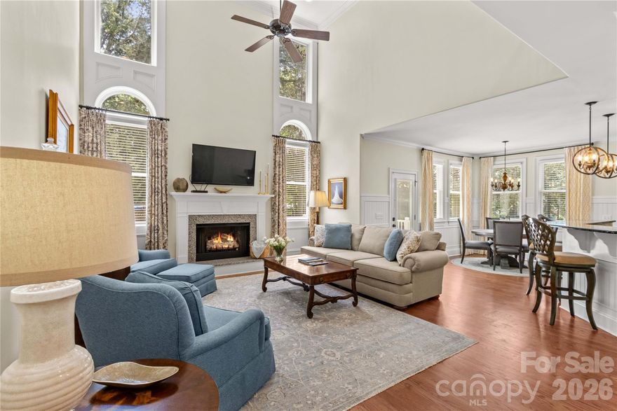 Welcome to beautiful Lake Norman! Discover this charming residence on a spacious half-acre lot with NO HOA fees & low Catawba County taxes. There's ample space for your RV, boat & water toys to enjoy days on the lake!  
The expansive Great Room features a two-story ceiling with high windows & a cozy fireplace. The kitchen boasts custom cabinets, granite countertops, stainless appliances & a breakfast bar. The breakfast & formal dining room w/vaulted ceiling both feature wainscoting & beautiful molding. Main-level primary bedroom has a lavish ensuite with a tiled walk-in shower & soaking tub. Upstairs are 2 spacious bedrooms (one ensuite), 2 full baths, a bonus room/bedroom & a loft area. Enjoy the two-car side load garage with epoxy flooring. EXTERIOR just REPAINTED! The expansive rear deck is perfect for entertaining & the yard has room for a pool if desired! Just minutes from shopping at The Village at Sherrills Ford & the shores of Lake Norman - expect to be impressed! FRESHLY PAINTED EXTERIOR JUST OCCURRED as well as NEWLY REFINISHED Main-level Hardwood Floors! Well maintained and move in ready! Privacy fence in back was recently installed. New roof installed January 2023. A new whole house water filtration system and water softener was installed June 2023. Reach out to listing agent with questions and thank you!