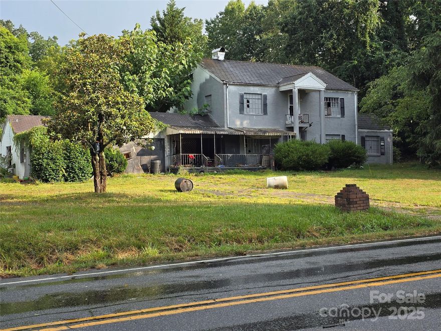 Rare chance to own 2.54 acres spanning 4 parcels, zoned Highway Business (HB) – offering exceptional visibility and access. Per the Town of Hildebran, this zoning allows for 50+ commercial uses, including office, retail, automotive services, bakery, church, convenience store, dry cleaning, club or lodge and many more.

Note: The existing home on the property cannot be used as a primary residence unless rezoned. Seller makes no representations regarding the structure, and agent has not entered due to its condition. Home has experienced a fire upstairs. 

Whether you're looking to develop, invest, or expand your business footprint—this versatile property offers endless potential in a growing area!