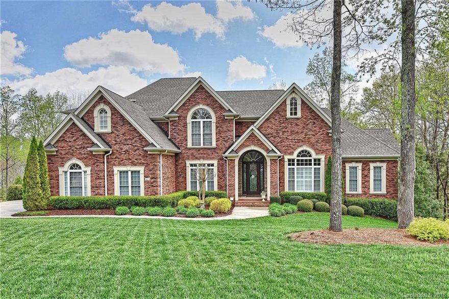 Immaculate Home on Full acre w/ Screened porch off family area. Gourmet Kitchen sized for entertaining w/ HUGE granite island & loads of Custom cabinets! Music room tray ceiling & built ins. Main level has 2-story Great room, Large Master suite & Gorgeous Bath w/ dual closets. 2nd Guest bed main level. FULL Basement w/ Billiards & Great room w/ walk-out patio. 3 Fireplaces. 3-car Garage. Level yard w/ by private woods back . Amazing MUST SEE Ceilings, Chandeliers, Wood Shutters add to elegance.