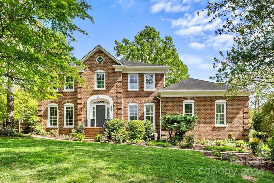 Nestled in the expansive golf community of Raintree, this extraordinary property sits gracefully on the 6th Tee of a scenic golf course, offering stunning views and serene surroundings of a small lake. Located at the end of a cul-de-sac, this home enjoys a sprawling yard with a sizable deck, a large in-ground saltwater pool and a pool house!
This 4 bedroom residence exudes timeless elegance with distinctive features like arched doorways, beamed ceilings, lustrous hardwood floors, and floor-to-ceiling windows that flood the space with natural light. 
Additionally, this home offers versatile flex spaces, a spacious drop zone and laundry room, and a cozy pool/guest house complete with high ceilings and a full bathroom making this property an ideal place for escape and relaxation  in a one of a kind setting.