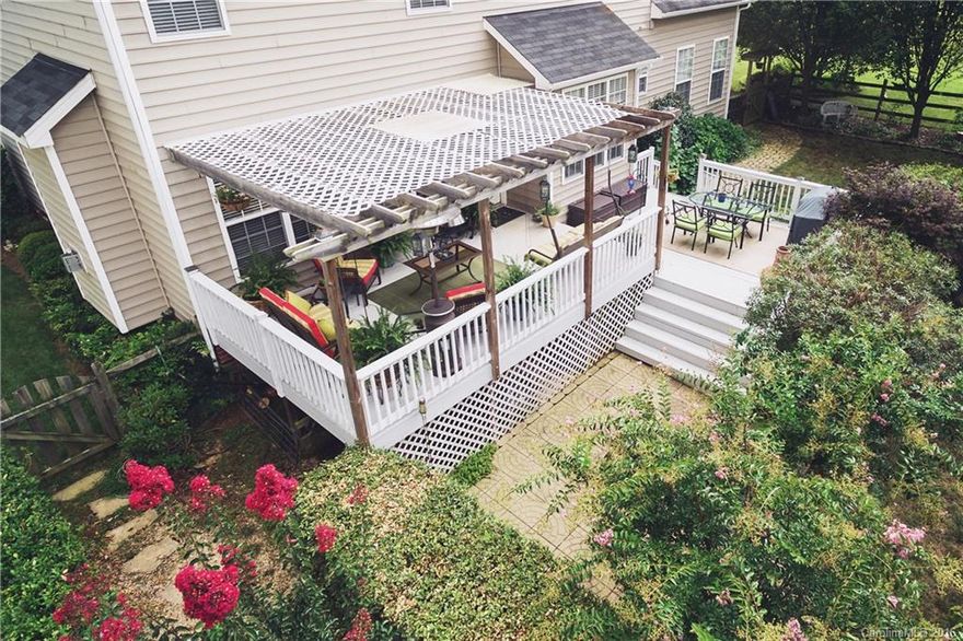 Beautiful Large Updated 4/5 Bedroom Home in desirable Northstone on a Corner lot.Move-in ready w fresh paint, new carpet, new hardware and fixture.Granite, SS appliance.Beautiful outdoor living spaces.Elevated rear deck featuring pergola.Lower concrete patio,surrounded by lush landscaping and fenced yard. Rockin'Chair porch in front & back.Bedroom w/Full Bath down & generational suite upstairs complete with kitchen.This is bdr 5 on the floorplan,ask your agent for the floorplan. Immaculate!!