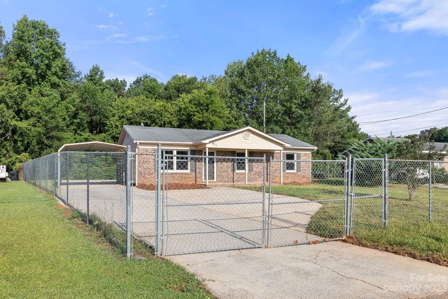 CUTE 3 bed, 2 bath home in Monroe! This home is FULLY fenced all the way around and has a quaint front porch, perfect for enjoying your morning coffee! There is a detached carport too- NICE! Walk into the home and you will find NEW LVP flooring throughout the entire house! The kitchen is GREAT with white shaker cabinets, granite countertops and NEW SS Appliances! Primary bedroom is spacious and features a closet and bathroom w/grey cabinets, white countertops and tub/shower combo! Both guest beds are good sizes and share the additional bathroom w/grey cabinets, white countertops, and tub/shower combo. GREAT home you need to see today!