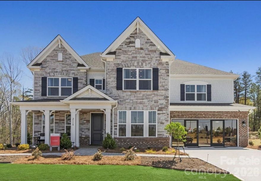 What's Special: Model Home | No Rear Neighbors | Dedicated Study | 1st Floor Guest Suite. Model Home -Available Now for July Closing! Built by America's Most Trusted Home Builder. Welcome to the London at 2118 Indigo Branch Road in Estates at Sugar Creek! This London model home offers a flexible floor plan that gives everyone a place to feel at home. The ground floor brings people together with an open-concept great room with a fireplace, a bright kitchen with a large island and breakfast nook, and a welcoming screened outdoor living area. A formal dining room connects to a spacious walk-in pantry and butler’s pantry, while a dedicated study and a private guest suite add comfort and ease. Thoughtful features like a coat closet and a garage entry vestibule help keep daily life organized. The second story opens to a sunny loft and a separate game room that create space for work and play. Four bedrooms complete the upstairs, including a peaceful primary retreat with dual vanities, two walk-in closets, a dedicated shower, a private enclosed commode, a free-standing soaking tub, and a tray ceiling for an added touch of warmth. Enjoy easy access to I-77, I-485, and Highway 521, plus the highly sought-after Ballantyne Bowl with new restaurants and lively community events. Your new home is also surrounded by natural beauty, with nearby Carolina woods, scenic parks, beautiful golf courses, and more. Additional Highlights Include: first floor guest suite with walk in shower, gas fireplace, 4-foot garage extension, bonus room, tray ceiling at primary suite, study with double French doors in place of flex room, additional windows at dining room and casual dining area, ensuite bath at secondary bedroom upstairs, screened covered outdoor living, tankless water heater, model home designer finishes, washer, dryer and refrigerator. MLS#4347057