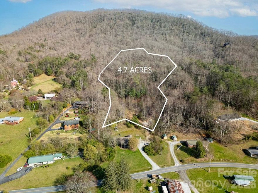 In the desirable Middlefork area, this +/- 4.787 acre, unrestricted tract of land consists of 2 parcels, (PIN:8552-81-4393 and 8552-81-5331), and it offers a gently sloping topography and roughed in driveway ideal for a variety of different home types. Establish your own mini-farm in the mountains of Western NC, or build your mountain getaway just minutes from some of the best hiking, biking, and trout fishing the area has to offer. This tract offers an abundance of opportunities, potential views from the upper portion, and an ideal location for your next project. If you are looking for a piece of land to park your RV and/or build your private RV mountain retreat, this parcel is worth a look.