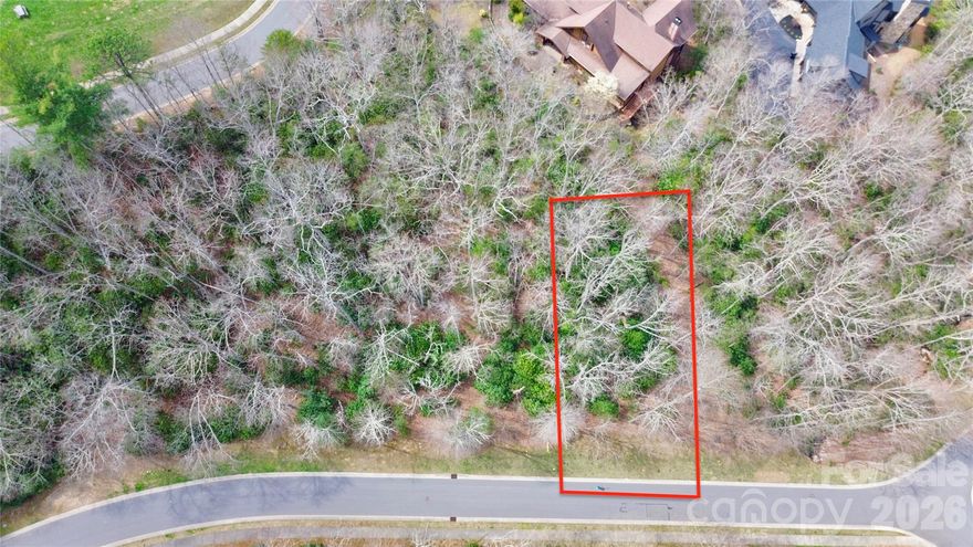 Tucked within the highly sought-after gated community of The Settings, this exceptional homesite at 21 Settings Boulevard offers a rare opportunity to build your mountain retreat in one of Black Mountain’s most thoughtfully designed neighborhoods. Surrounded by rolling topography, the property provides a beautiful natural setting with the potential for long-range mountain views depending on home placement.

The Settings is known for its blend of privacy, community, and upscale amenities, including paved roads, underground utilities, clubhouse, fitness center, walking trails, and community green spaces—all just minutes from the charm and convenience of downtown Black Mountain.

A premier setting to bring your vision to life.