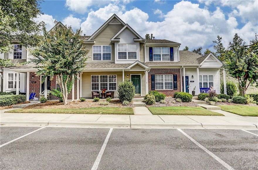 Hard to find townhouse in Indian Land.  Convenient to 521 & Ballantyne!  3 bedroom 2 1/2 bath.  Master has large walk in closet and double sinks in bathroom.  Fireplace in great room.  Nice deck in back overlooking trees.  Additional storage in the back.  Home comes with home warranty and fridge!  Home has 2 dedicated spaces, and plenty of visitor parking nearby.  Great community clubhouse and pool to enjoy! Lawn maintenance included in HOA fees!  Quiet area at back of community. Won't Last!