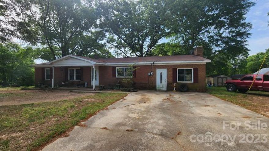 Full Brick home listed as is . Newer roof and HVAC and windows, but still needing rehab due to age and normal wear and tear, great project home , or super opt for your place in the country ! Home has termites and post beetles, will need cash buyer, Sold as is , Personals will be removed.