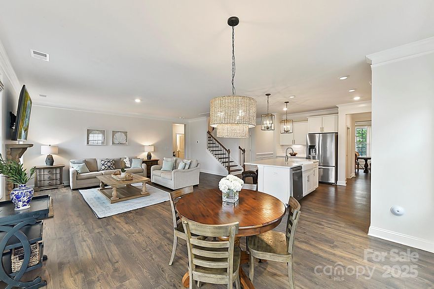 Welcome Home to this beautiful 5 bedroom/4 bath home in sought after Avondale! The inviting front porch, open and functional floorplan, upgraded lighting, and freshly painted interior will make you fall in love. Entertain in the formal dining room which leads to gorgeous designer kitchen w/gas cooktop, stainless appliances, large center island, butlery and walk in pantry. Open to the kitchen is a bright breakfast nook and spacious living room w/ beautiful stone surround gas fireplace. Main floor bedroom & full bath, plus drop zone, and attached 2 car garage. Upper-level boasts oversized primary suite with sitting area, large walk in closet, tub and dual vanities. 3 generously sized bedrooms & an additional 2 full baths and laundry room complete the upstairs. Lovely fenced yard and extended patio area for you to relax and entertain. Resort-style amenities include clubhouse, fitness center, pool, and playground! Short drive to Ballantyne for premier shopping, dining, and entertainment.