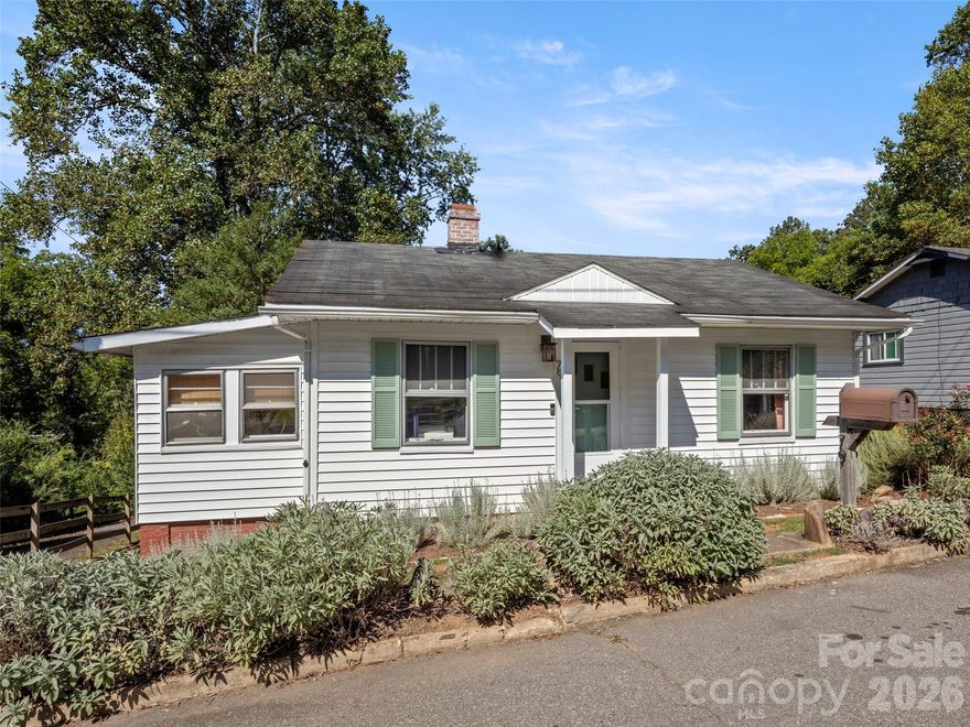 Welcome to 79 Craig Circle, a delightful 2-bedroom, 1-bath home in the heart of East Asheville. This well maintained property offers both comfort and convenience, with a newly refurbished bathroom adding a fresh modern touch. The inviting layout provides cozy living spaces, while the large fenced backyard is perfect for outdoor enjoyment. A spacious back patio creates an ideal setting for entertaining, grilling, or relaxing with family and friends. Located close to shops, restaurants, and everyday conveniences, this home also offers quick access to the interstate and the scenic Blue Ridge Parkway, making it easy to enjoy all that Asheville has to offer. Whether you're a first-time buyer, downsizing, or looking for a low-maintenance retreat, this East Asheville gem combines location, updates, and charm. Don't miss the chance to make 79 Craig Circle your next home.