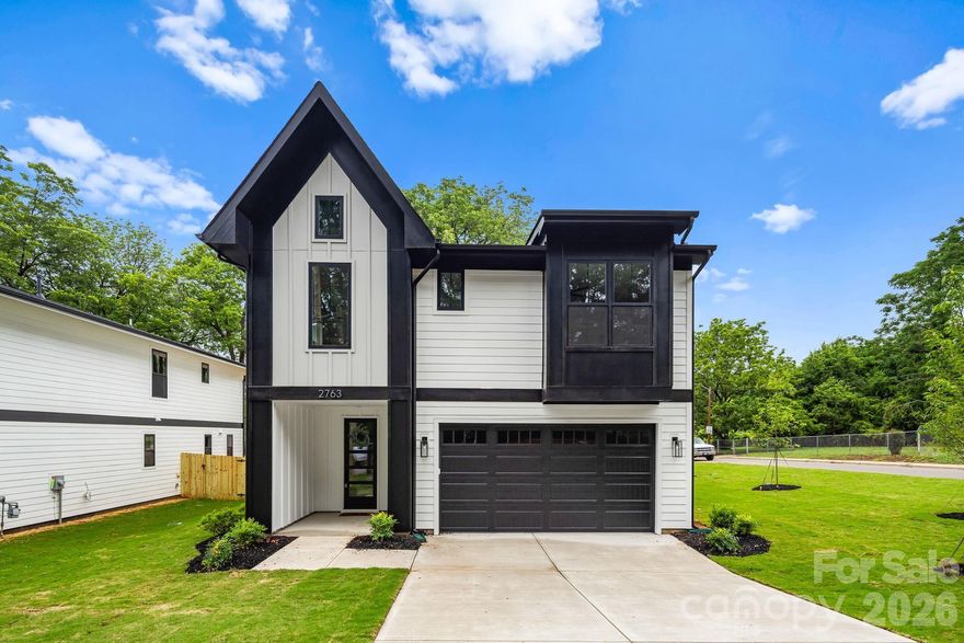 Enjoy prime Enderly Park location in this brand new build and enjoy views of the park and Uptown from the front yard. This beautifully designed modern residence is currently complete and move in ready, offering you the rare opportunity to be the first owner to enjoy this spectacular build from KO Construction. Step inside to an open, spacious living area that flows seamlessly into a large gourmet kitchen and dining space – perfect for entertaining. Elevated modern finishes impress at every turn: beautiful engineered hardwood floors throughout, custom-level tile in the kitchen and bathrooms, and sleek, high-end selections that elevate the entire home. All kitchen appliances are included! Prepare to be wowed by the expansive primary suite – a true retreat with generous space and luxurious details. The home features a convenient two-car garage, sodded front yard, and a fully fenced backyard. Complete with a builder warranty for complete peace of mind. Don’t miss your chance to own a brand-new home in one of Charlotte’s most desirable up-and-coming areas!
