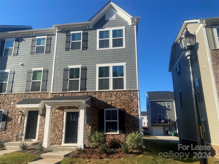 Like new end unit 3 level townhome. Mail level features 2 car garage with opener, Den area with multiple closets, Second level has a wide open floor plan with kitchen, dining, and living area. Upper level features large primary bedroom and bath, Two additional bedrooms and a hallway full bath.