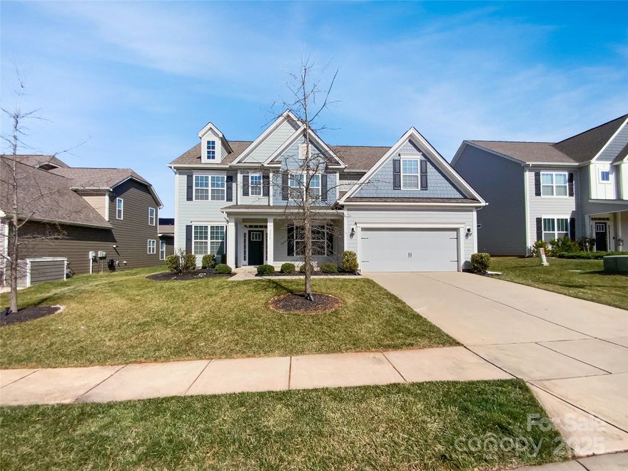 Seller may consider buyer concessions if made in an offer. Welcome to your dream home! This stunning property boasts a cozy fireplace, a natural color palette throughout, and a spacious kitchen with a center island and a nice backsplash. The primary bedroom features a walk-in closet, while other rooms offer flexible living space for your needs. The primary bathroom is equipped with a separate tub and shower, double sinks, and good under sink storage. Step outside to enjoy the serene sitting area in the backyard. Don't miss out on this incredible opportunity.