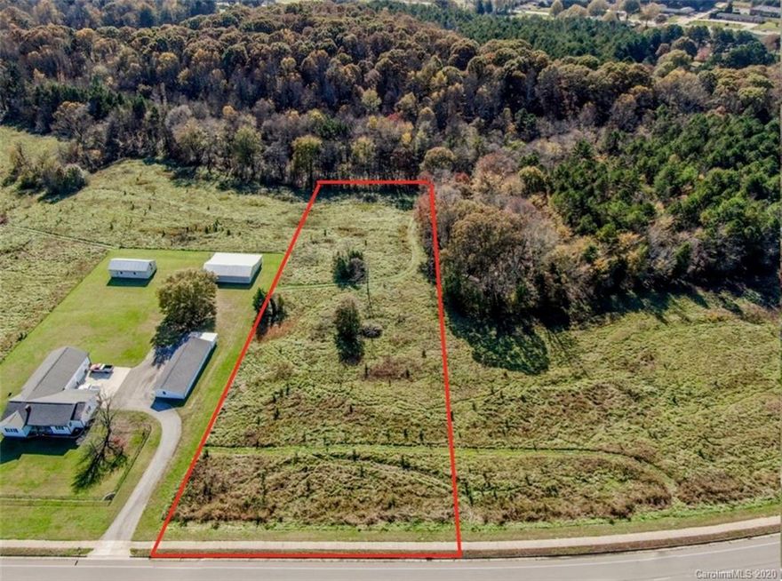 4.13 Acre Parcel w/272 ft of Road Frontage on Brawley School Rd. Highly desirable property located close to shopping, medical, etc.  No time to build.  Great potential for office/commercial.  Would be subject to rezoning.  Easy access to I-77.