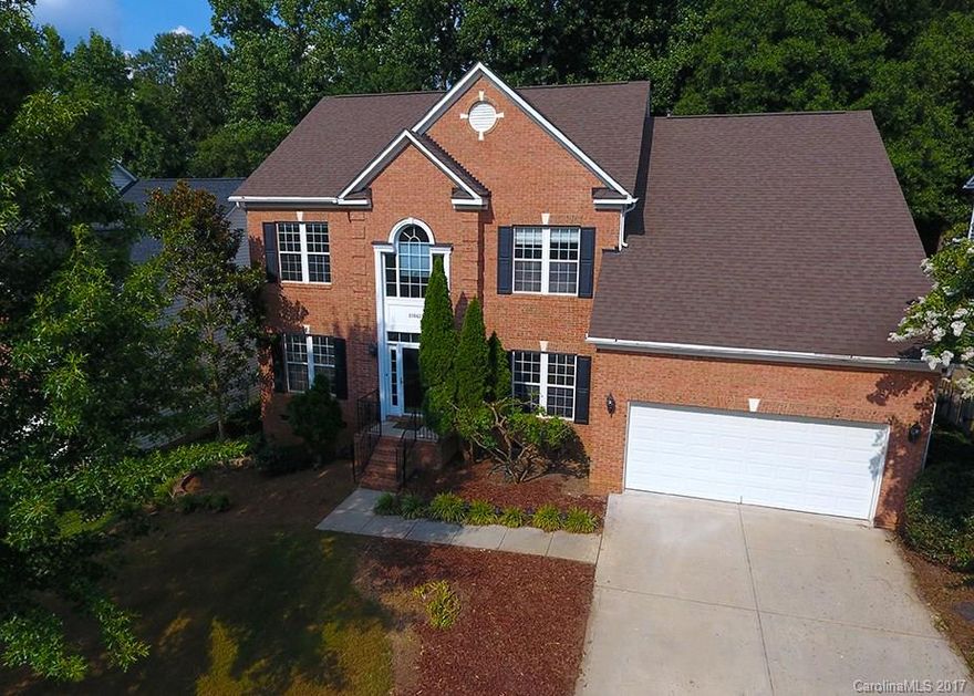 $35,000 reduction: Location, schools, updates galore, ultimate backyard - you’ll fall in love with this sparkling Ballantyne home. Natural light beams off new hardwoods. Kitchen sparkles with granite/stainless steel, opening to family room & sunroom. Ridiculous backyard with custom fire pit, paver patio, 476-sf deck, mature trees, privacy fence. 618-square foot master suite (oasis?). Family room sizzles with gas fireplace. Zoned for Ardrey Kell High. 2 min to Ballantyne restaurants/shopping